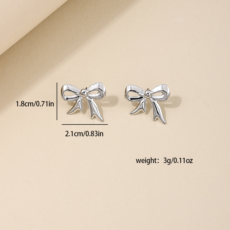 1 Pair Simple Style Bow Knot Plating Alloy Ear Studs display picture 5
