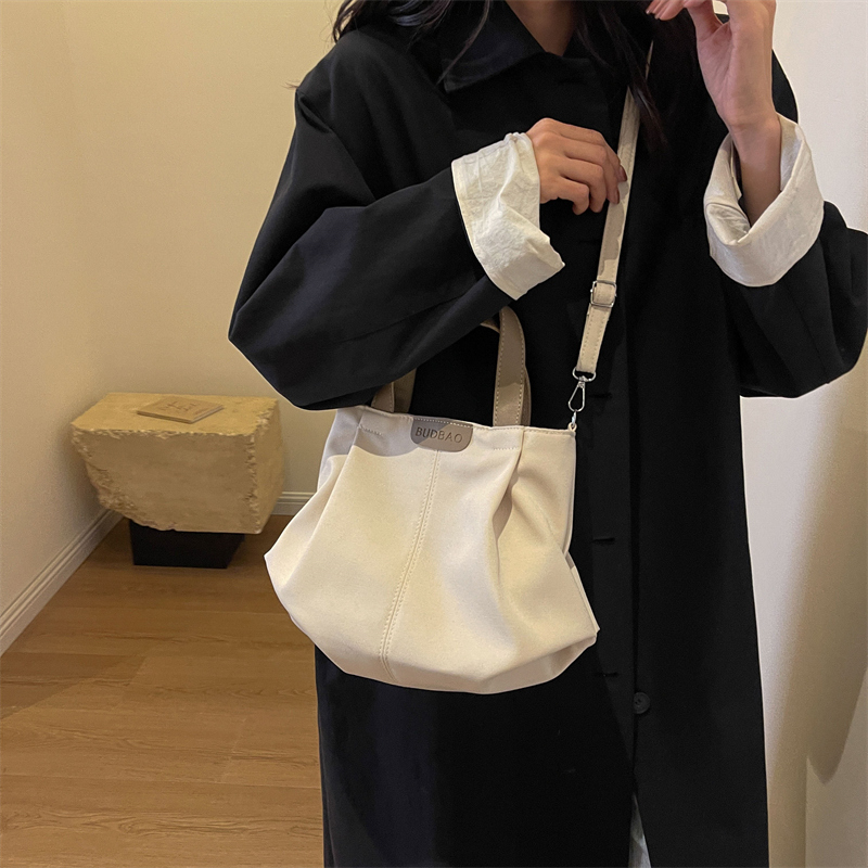 Women's Canvas Solid Color Classic Style Sewing Thread Square Zipper Handbag display picture 13