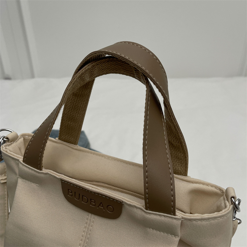 Women's Canvas Solid Color Classic Style Sewing Thread Square Zipper Handbag display picture 3