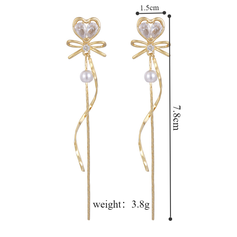 1 Pair Elegant Glam Heart Shape Bow Knot Tassel Plating Inlay Copper Artificial Pearls Zircon Drop Earrings display picture 1