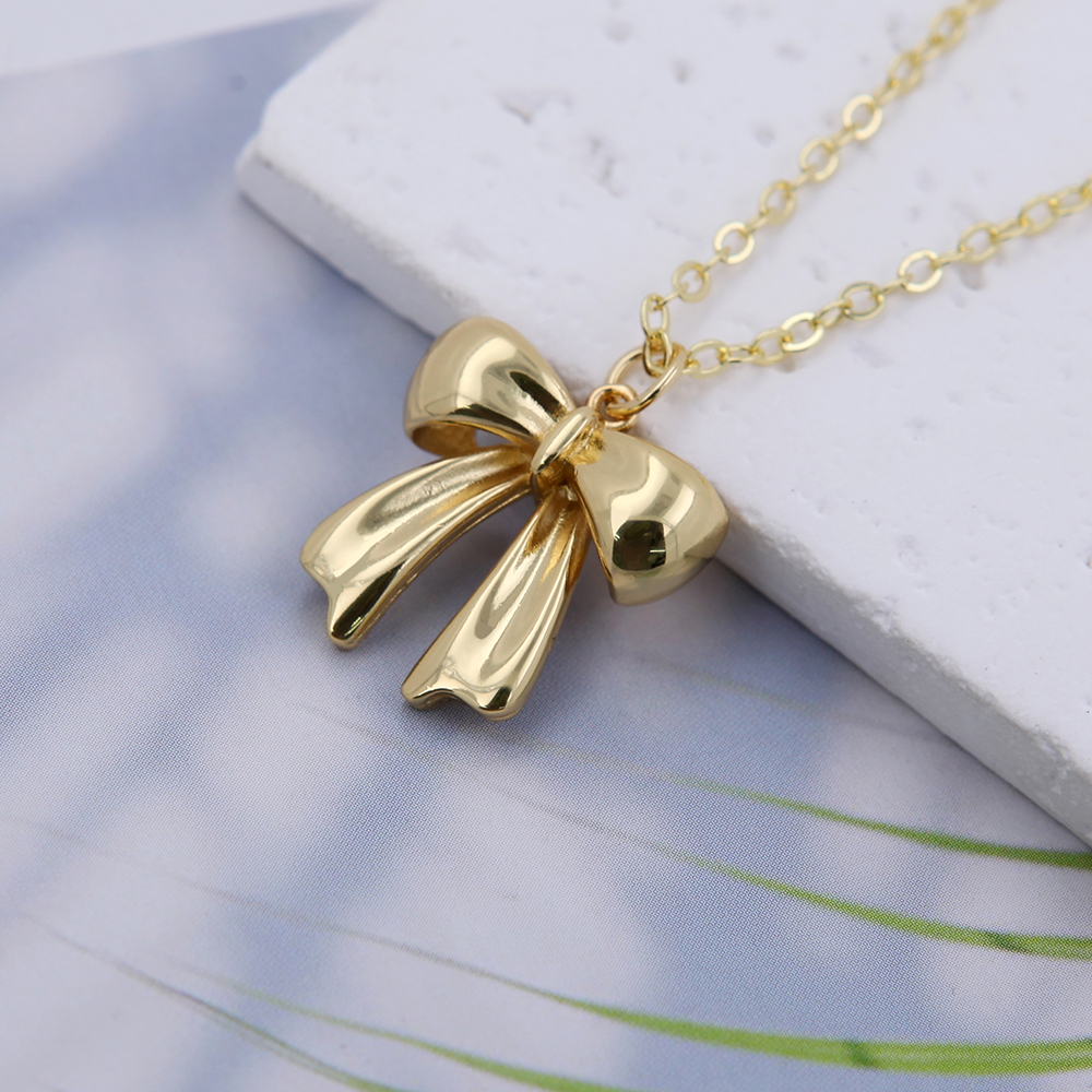 Copper 18K Gold Plated White Gold Plated Cute Solid Color Plating Bow Knot Pendant Necklace display picture 4