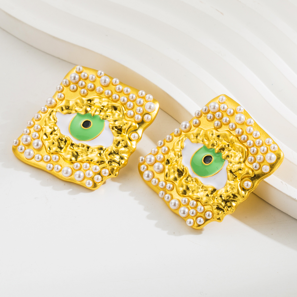 1 Paar Elegant Luxuriös Auge Überzug Inlay Zinklegierung Harz Perle Vergoldet Ohrstecker display picture 6