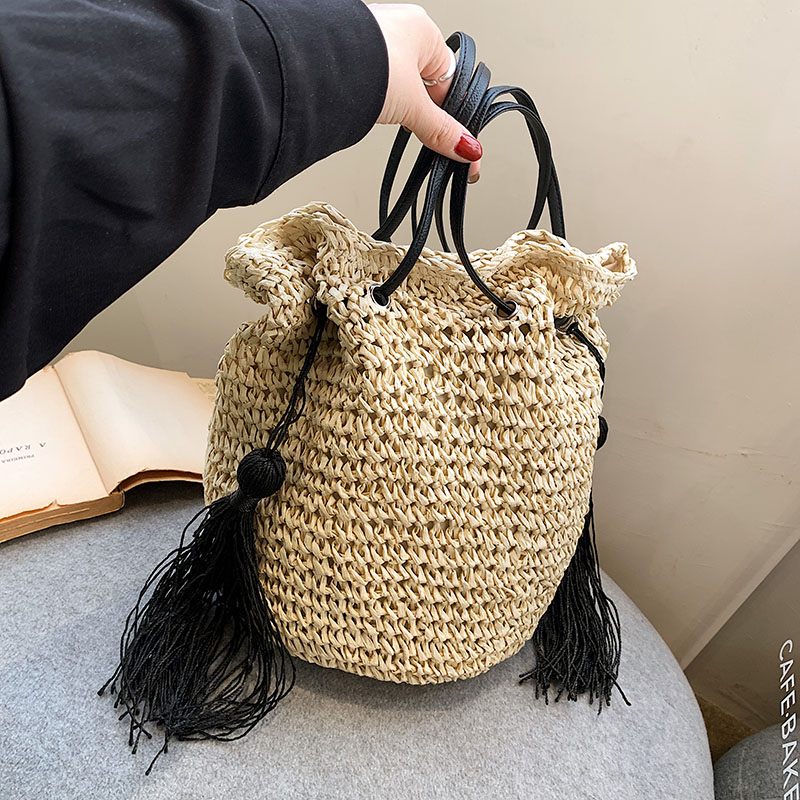 Women's Straw Solid Color Vacation Tassel Bucket String Straw Bag display picture 13
