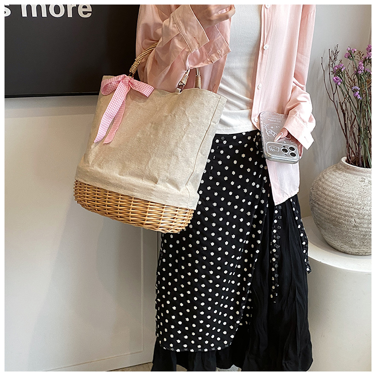 Women's Large Straw Solid Color Flower Bow Knot Vacation Beach Weave Bucket Open Handbag Straw Bag display picture 5