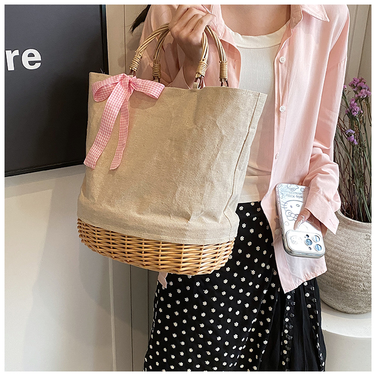 Women's Large Straw Solid Color Flower Bow Knot Vacation Beach Weave Bucket Open Handbag Straw Bag display picture 6