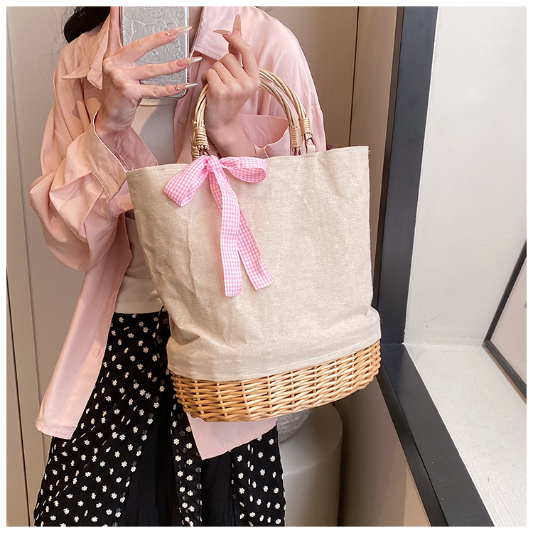 Women's Large Straw Solid Color Flower Bow Knot Vacation Beach Weave Bucket Open Handbag Straw Bag display picture 10