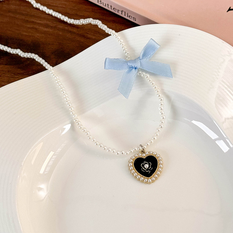 Elegant Glam Sweet Heart Shape Flower Bow Knot Imitation Pearl Alloy Beaded Inlay Rhinestones Pearl Women's Pendant Necklace display picture 10