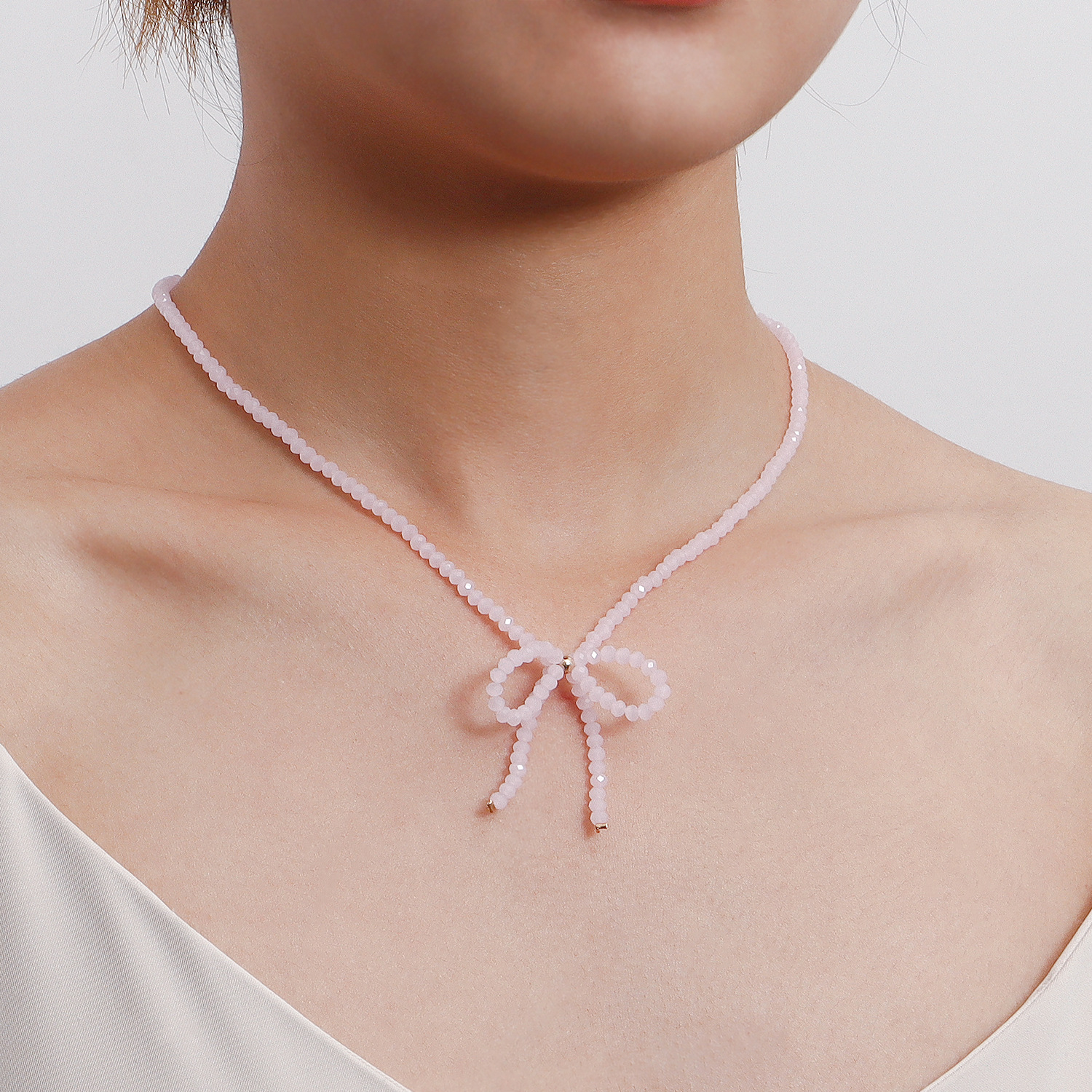 Einfacher Stil Pendeln Bogenknoten Künstliche Perle Perlen Frau Halskette display picture 6