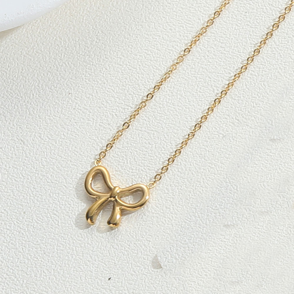 Copper 14K Gold Plated Simple Style Inlay Bow Knot Zircon Pendant Necklace display picture 10