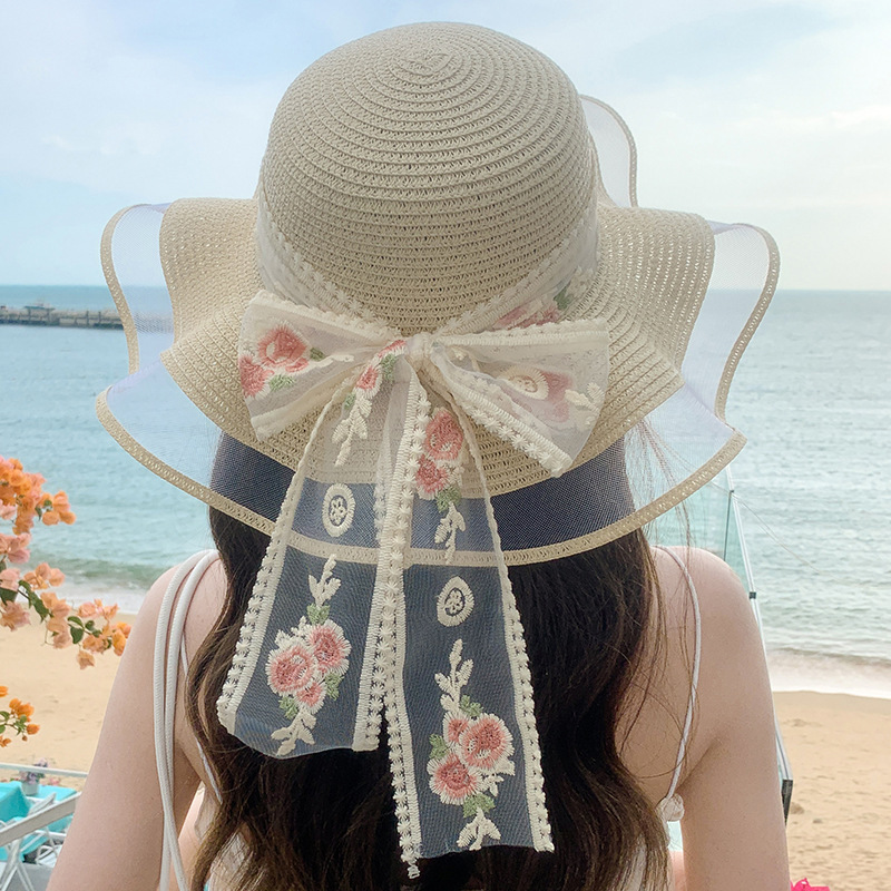 Women's Elegant Vacation Flower Bowknot Big Eaves Sun Hat display picture 1