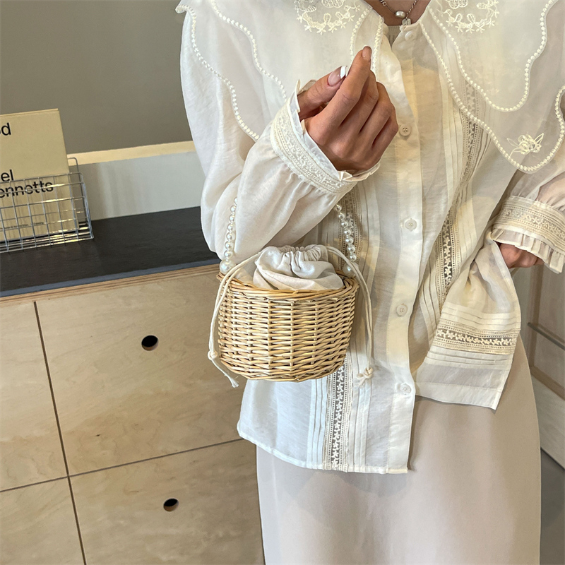 Women's Medium Straw Solid Color Vacation Beach Pearls Weave String Straw Bag display picture 7