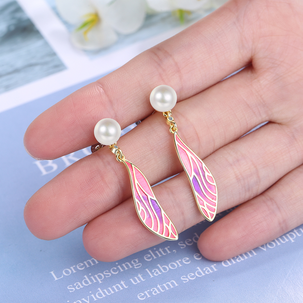 1 Pair Simple Style Classic Style Wings Plating Inlay Copper Rhinestones Pearl Drop Earrings display picture 9