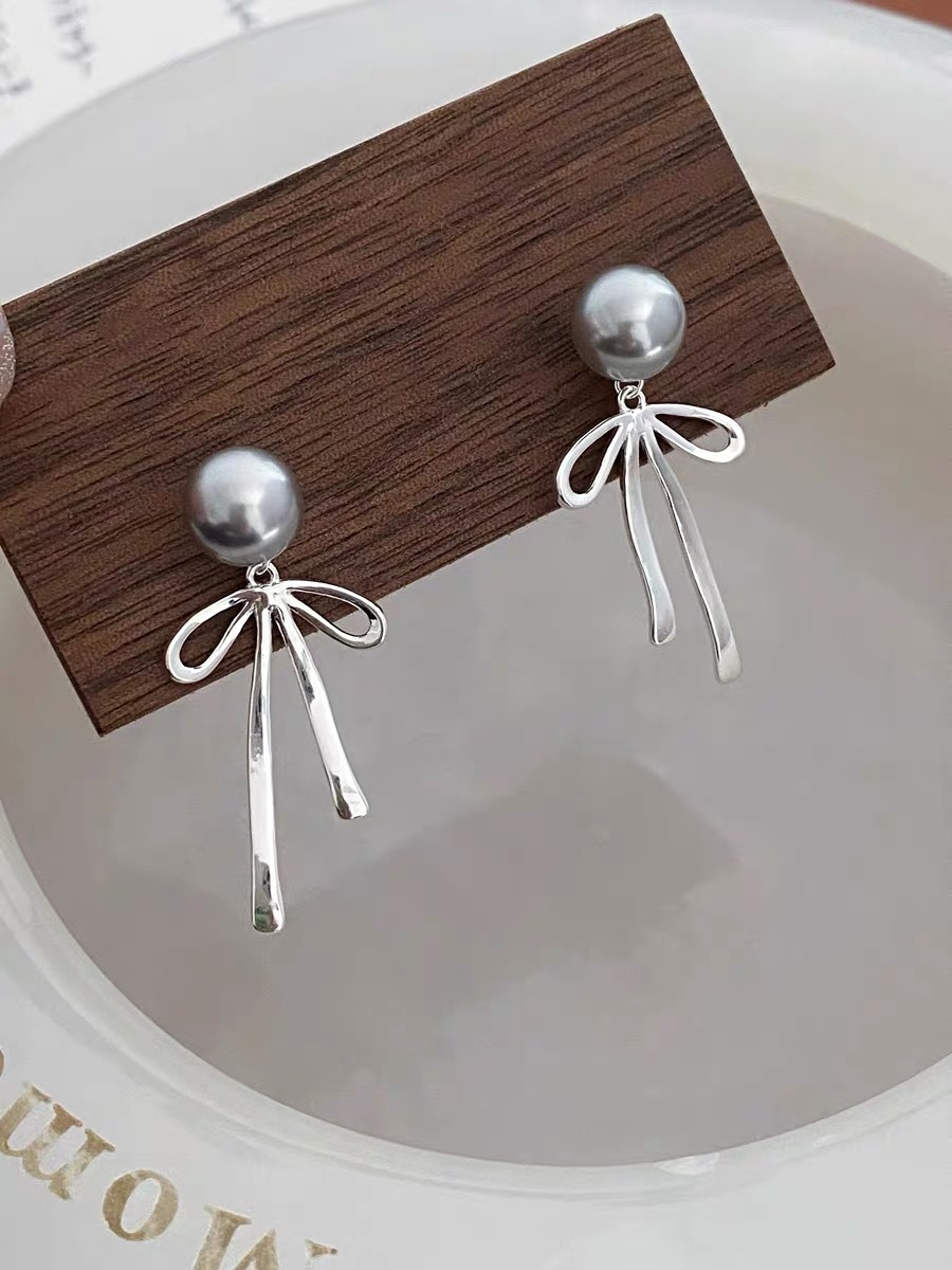 1 Pair Simple Style Bow Knot Plating Sterling Silver Ear Studs display picture 7