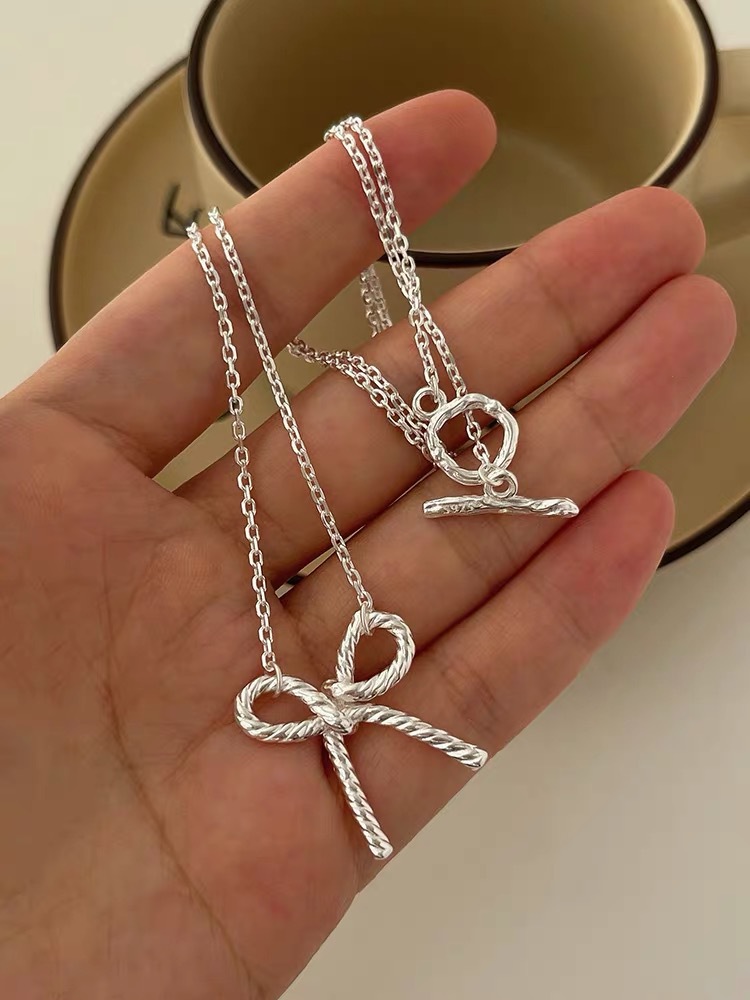 Sterling Silver Casual Chain Geometric Bow Knot Pendant Necklace display picture 5