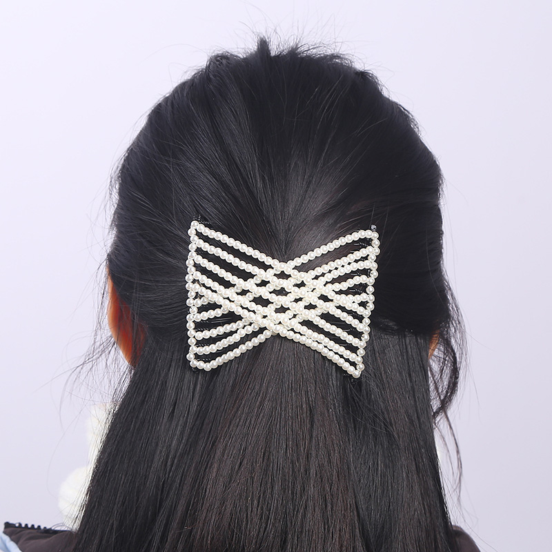 Women's Casual Simple Style Round Artificial Pearl Plastic Resin Beaded Insert Comb display picture 1