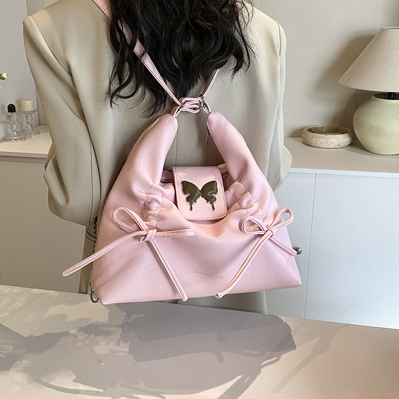 Women's Medium Pu Leather Solid Color Butterfly Streetwear Pillow Shape Zipper Crossbody Bag display picture 8