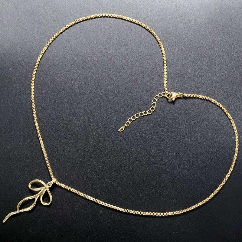 Kupfer 18 Karat Vergoldet Lässig Elegant Einfacher Stil Bogenknoten Halskette Mit Anhänger display picture 5