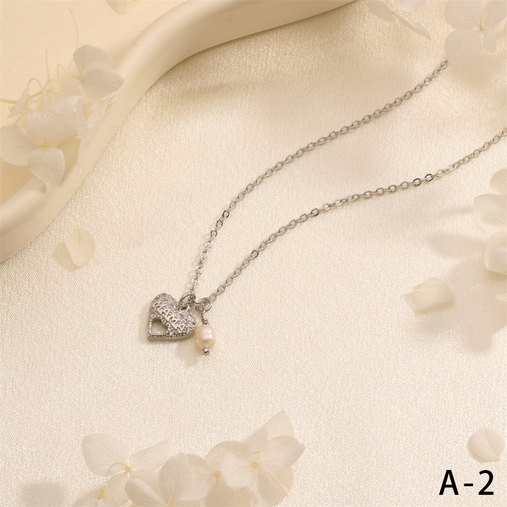 Copper 18K Gold Plated Simple Style Commute Inlay Letter Heart Shape Zircon Pendant Necklace display picture 8