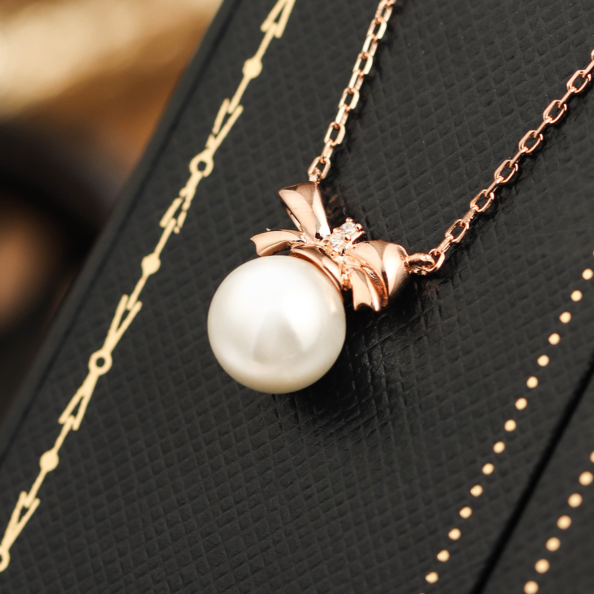 Sterling Silver Rose Gold Plated Elegant Inlay Bow Knot Pearl Pendant Necklace display picture 4