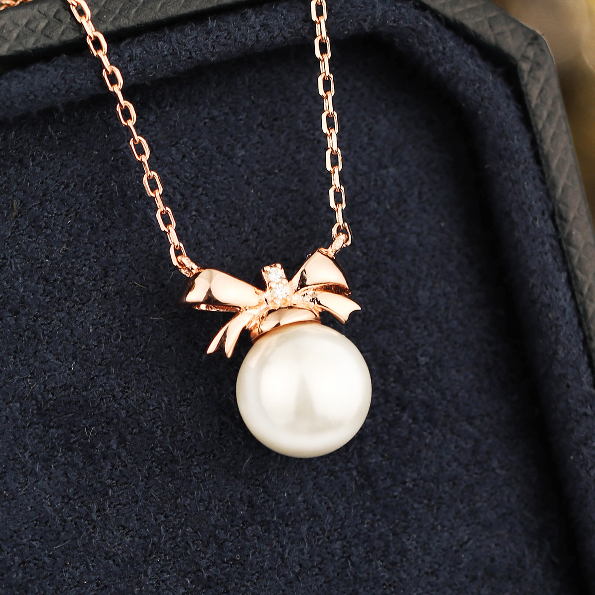 Sterling Silver Rose Gold Plated Elegant Inlay Bow Knot Pearl Pendant Necklace display picture 5