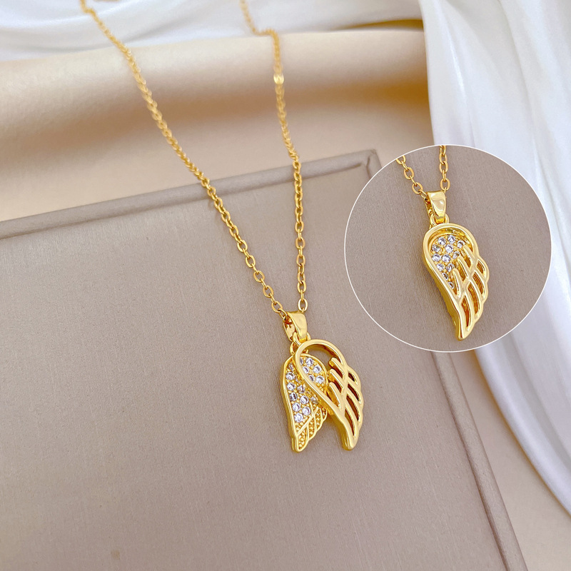 Wholesale Elegant Luxurious Wings Titanium Steel Copper Hollow Out Inlay Zircon Pendant Necklace display picture 1