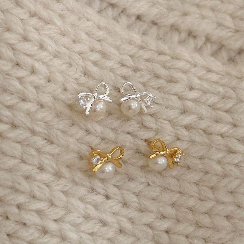 1 Pair Simple Style Bow Knot Inlay Sterling Silver Pearl Ear Studs display picture 1
