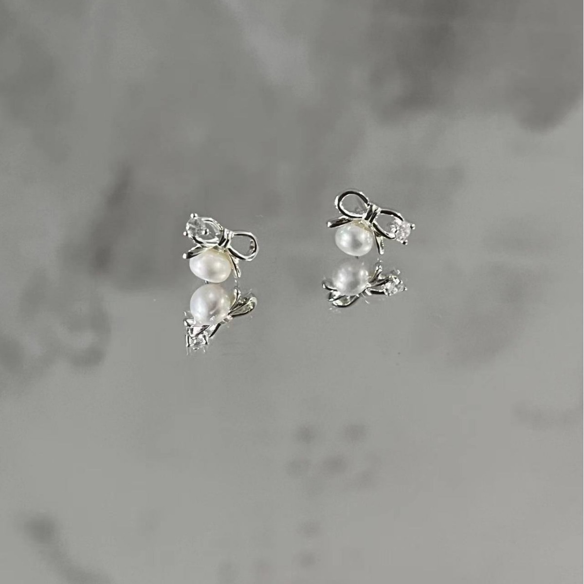 1 Pair Simple Style Bow Knot Inlay Sterling Silver Pearl Ear Studs display picture 4