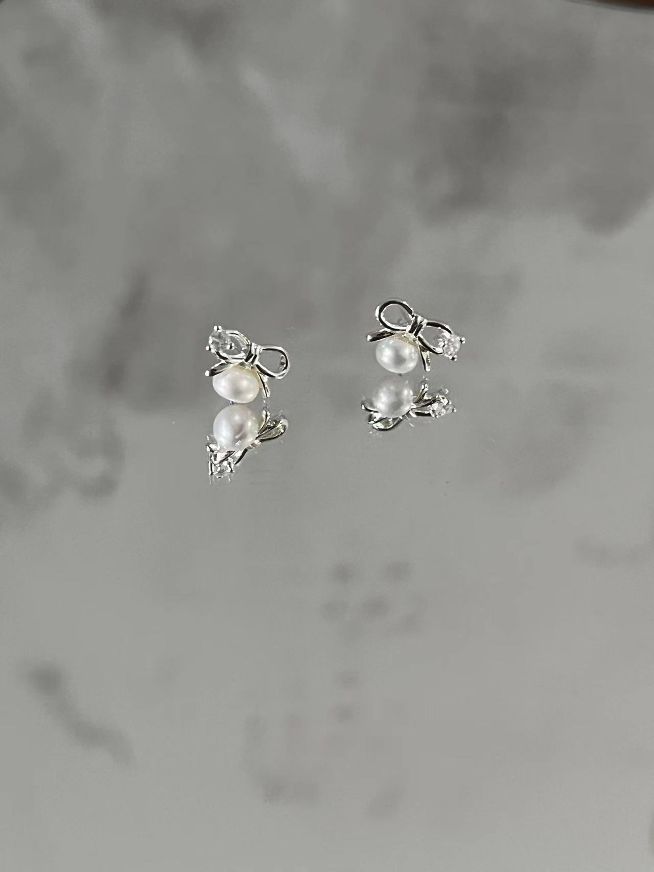 1 Paire Style Simple Noeud D'Arc Incruster Argent Sterling Perle Boucles D'Oreilles display picture 9