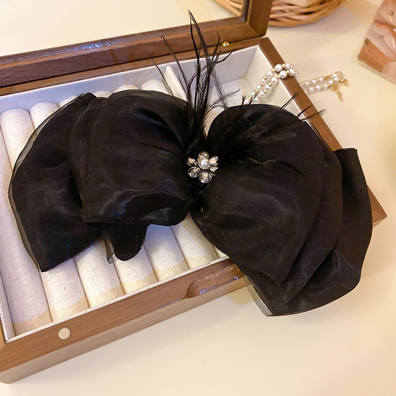 Frau Lässig Einfacher Stil Bogenknoten Legierung Tuch Inlay Künstliche Perlen Haarklammer display picture 8