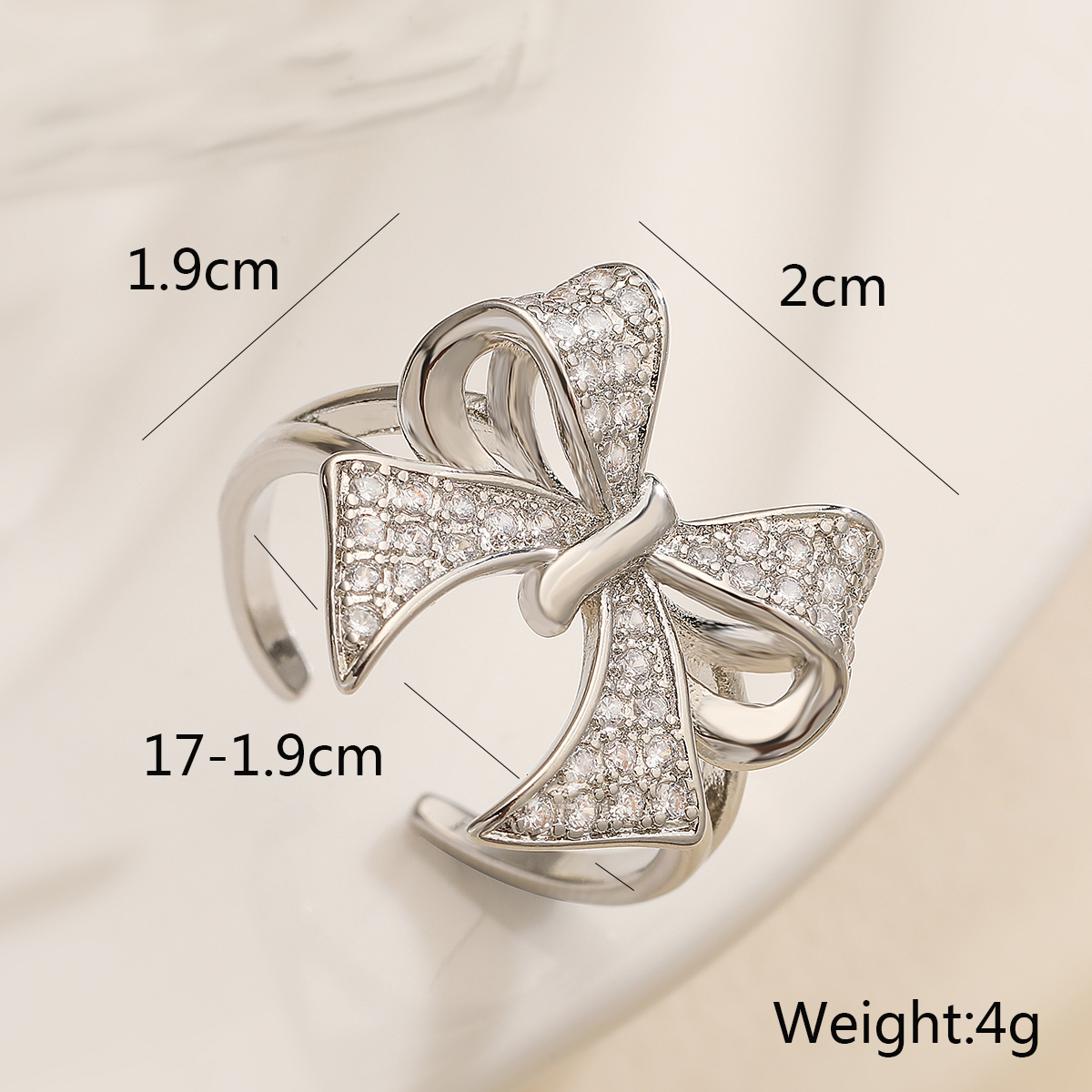 Copper 18K Gold Plated White Gold Plated Simple Style Inlay Bow Knot Zircon Open Rings display picture 4