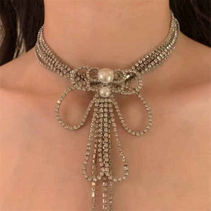 Wholesale Jewelry Sexy Bow Knot Arylic Rhinestone Copper Glass Silver Plated Inlay Long Necklace display picture 1