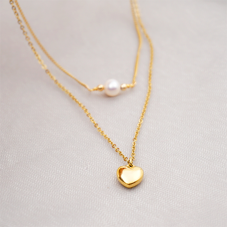 304 Stainless Steel Titanium Steel Gold Plated Simple Style Inlay Heart Shape Artificial Pearls Double Layer Necklaces Sweater Chain display picture 5