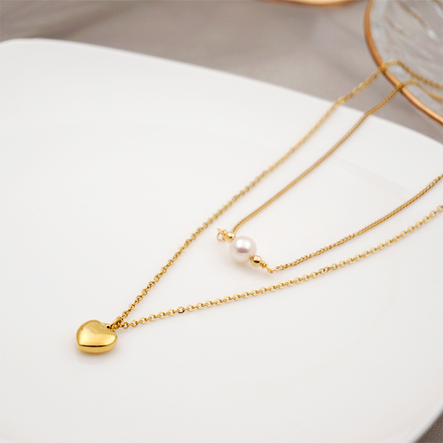 304 Stainless Steel Titanium Steel Gold Plated Simple Style Inlay Heart Shape Artificial Pearls Double Layer Necklaces Sweater Chain display picture 2