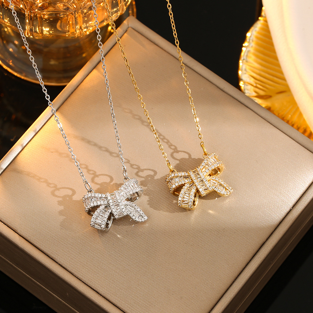Wholesale Casual Commute Heart Shape Mermaid Bow Knot Titanium Steel Hollow Out Inlay 18K Gold Plated Zircon Pendant Necklace display picture 1
