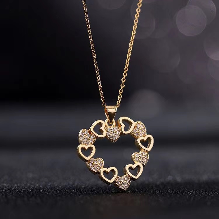 Wholesale Jewelry Simple Style IG Style Heart Shape Stainless Steel Alloy Rhinestones Gold Plated Polishing Hollow Out Inlay Pendant Necklace display picture 1