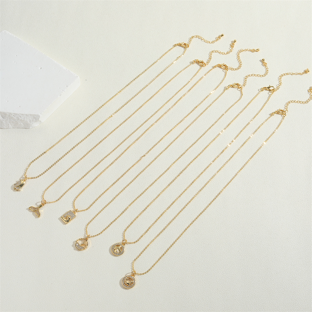 Copper 14K Gold Plated Vintage Style Simple Style Commute Hollow Out Inlay Penguin Round Fish Tail Zircon Pendant Necklace display picture 1