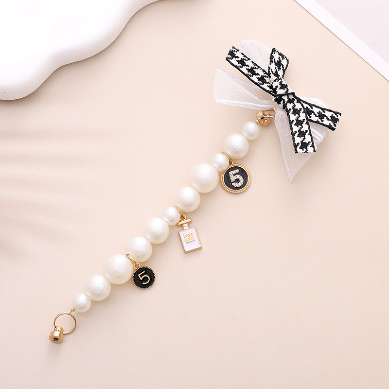 Simple Style Heart Shape Bow Knot Imitation Pearl Beaded Plating Inlay Rhinestones Mobile Phone Chain display picture 2