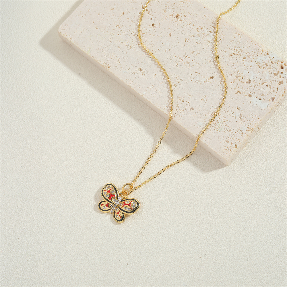 Copper 14K Gold Plated Vintage Style Simple Style Commute Enamel Inlay Carrot Flower Butterfly Zircon Pendant Necklace display picture 1
