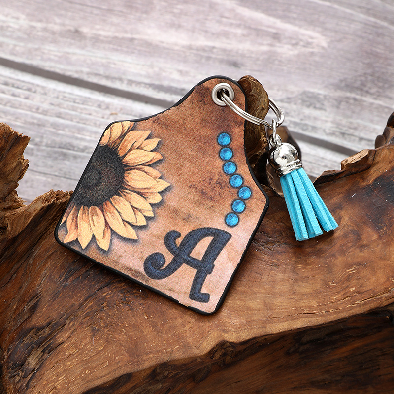 Luxurious Simple Style Commute Sunflower Letter Pu Leather Printing Tassel Bag Pendant Keychain display picture 4