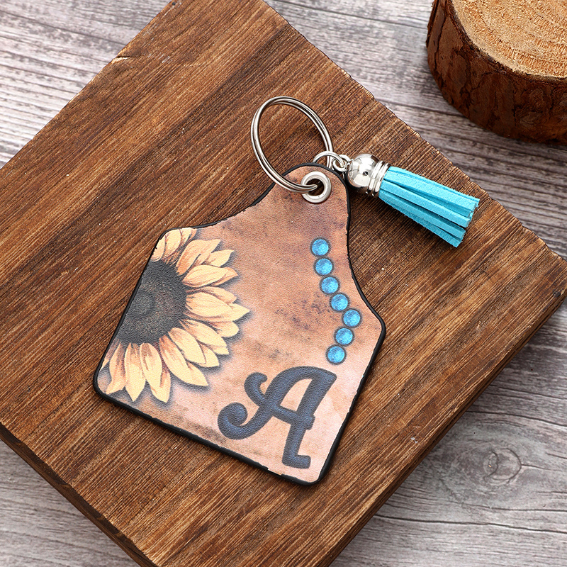 Luxurious Simple Style Commute Sunflower Letter Pu Leather Printing Tassel Bag Pendant Keychain display picture 5