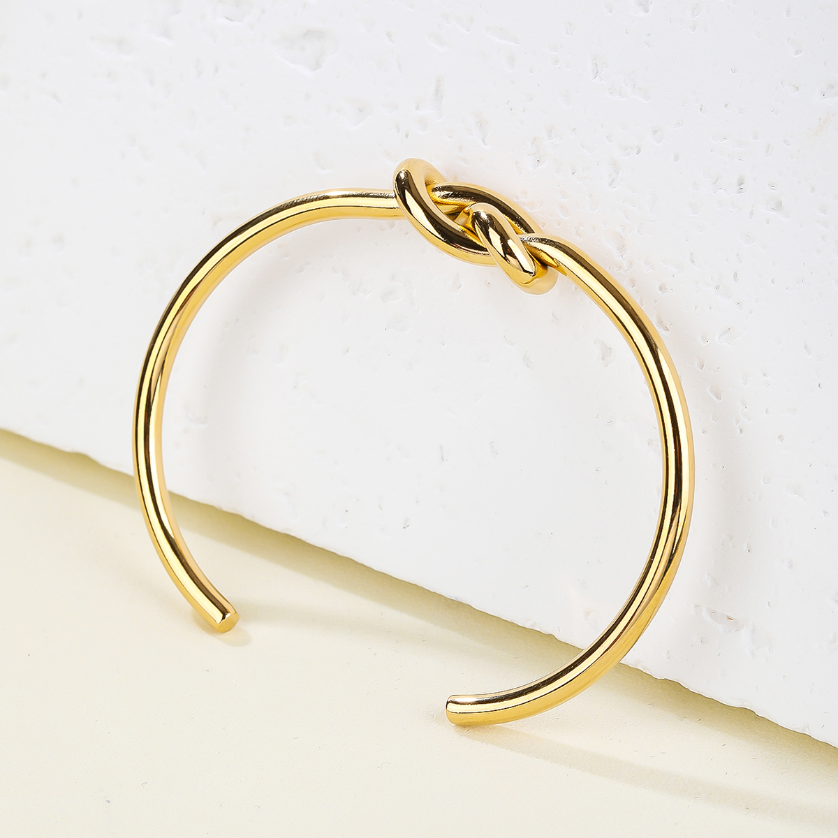 Stainless Steel 14K Gold Plated Vintage Style Simple Style Solid Color Knot Bangle display picture 3
