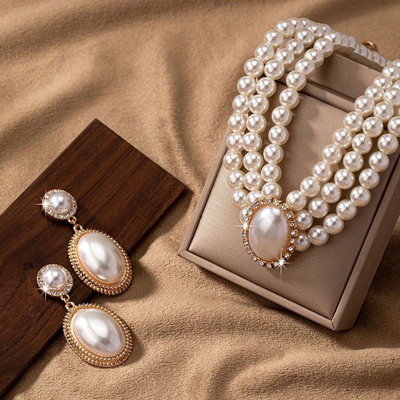 Elegant Luxurious Solid Color Plastic Plating Inlay Pearl 14K Gold Plated Women's Jewelry Set display picture 1