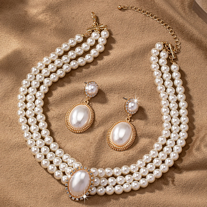 Elegant Luxurious Solid Color Plastic Plating Inlay Pearl 14K Gold Plated Women's Jewelry Set display picture 3