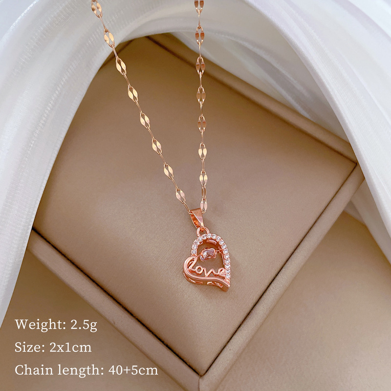 Titan Stahl IG-Stil Aushöhlen Inlay Liebe Herzform Künstliche Edelsteine Halskette Mit Anhänger display picture 5