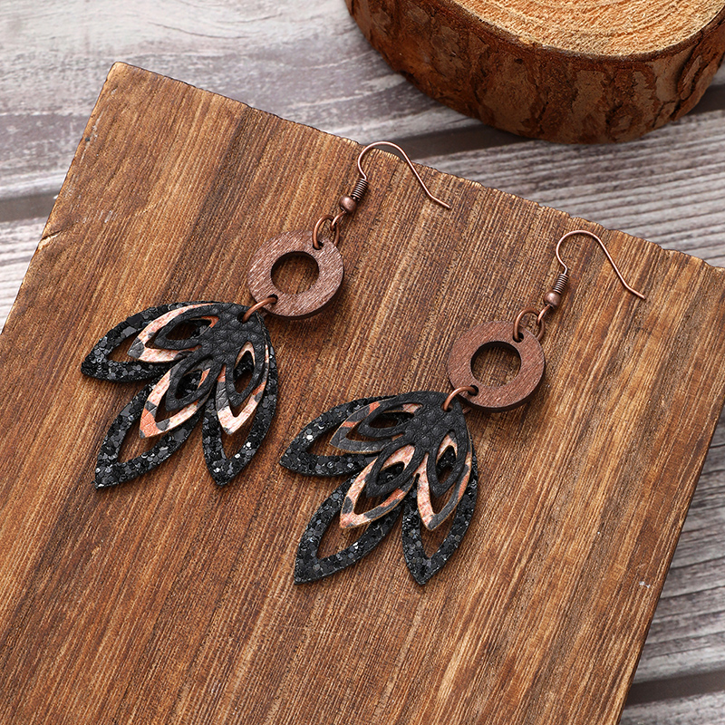 1 Pair Simple Style Classic Style Commute Maple Leaf Hollow Out Pu Leather Drop Earrings display picture 8