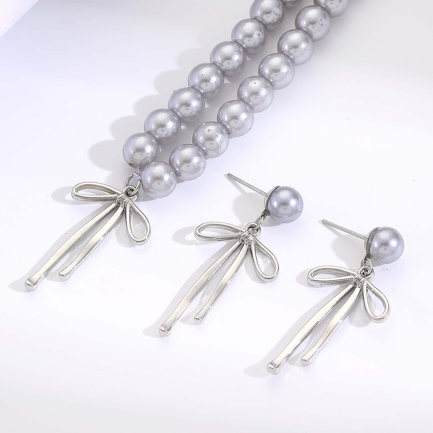 Elegant Einfacher Stil Bogenknoten Künstliche Perle Legierung Perlen Frau Schmuck-Set display picture 4