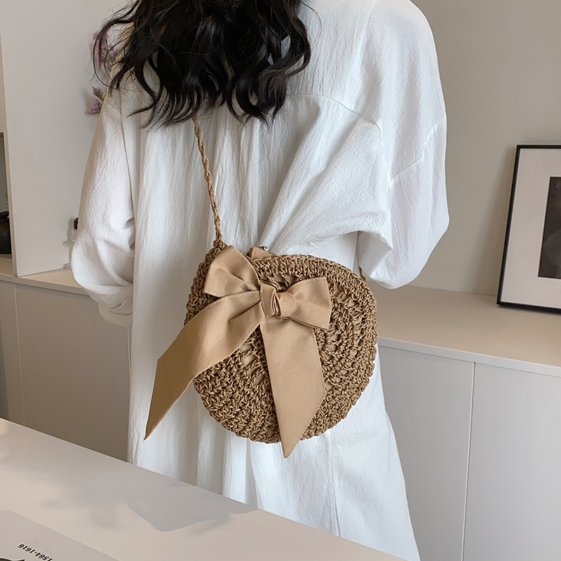 Women's Medium Straw Solid Color Vacation Beach Ribbon Weave Round Zipper Straw Bag display picture 4