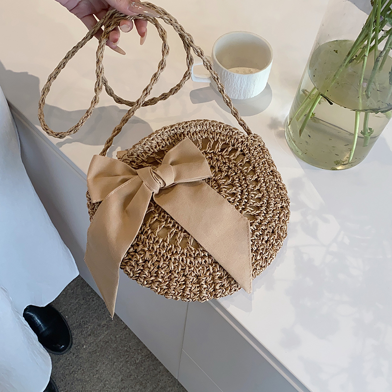 Women's Medium Straw Solid Color Vacation Beach Ribbon Weave Round Zipper Straw Bag display picture 3