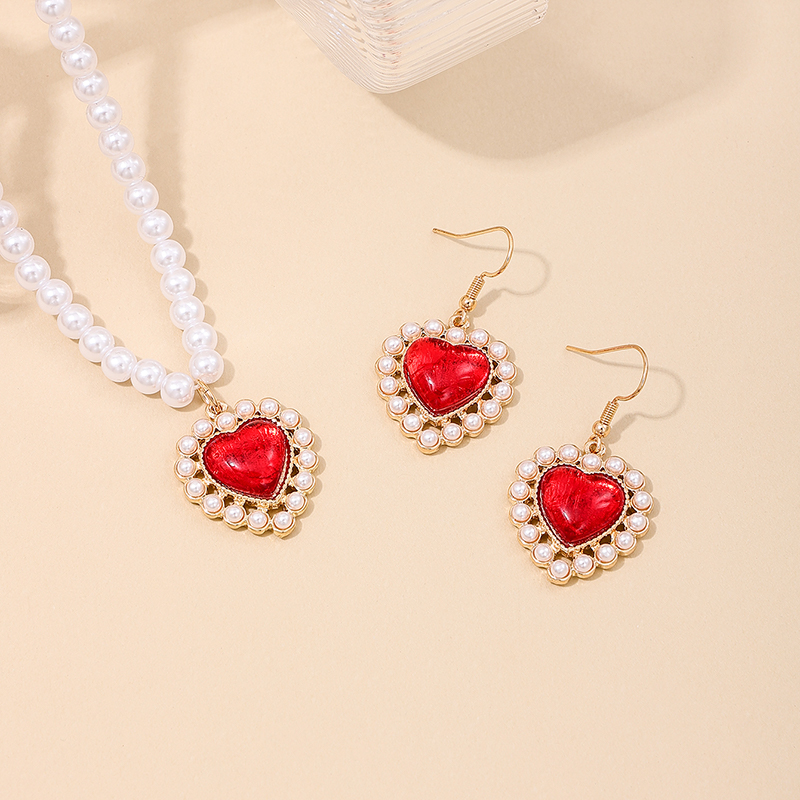 Simple Style Classic Style Heart Shape Alloy Inlay Artificial Pearls Resin Women's Jewelry Set display picture 2