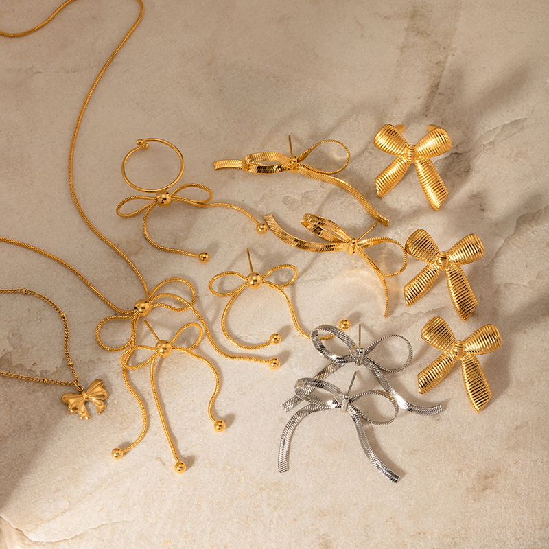 IG-Stil Elegant Bogenknoten Legierung Überzug Frau Ringe Ohrringe Halskette display picture 1